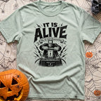 Volt From The Dead - T-Shirt in Bay - A black and white illustration of Frankenstein's monster pulling a large knife...