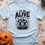 Volt From The Dead - T-Shirt in Chambray - A black and white illustration of Frankenstein's monster pulling a large knife...