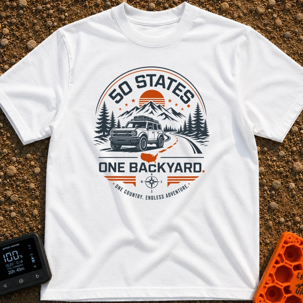 Fifty State Backyard - T-Shirt in White - A circular badge design featuring an off-road SUV parked next to a winding...