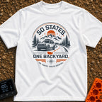 Fifty State Backyard - T-Shirt in White - A circular badge design featuring an off-road SUV parked next to a winding...