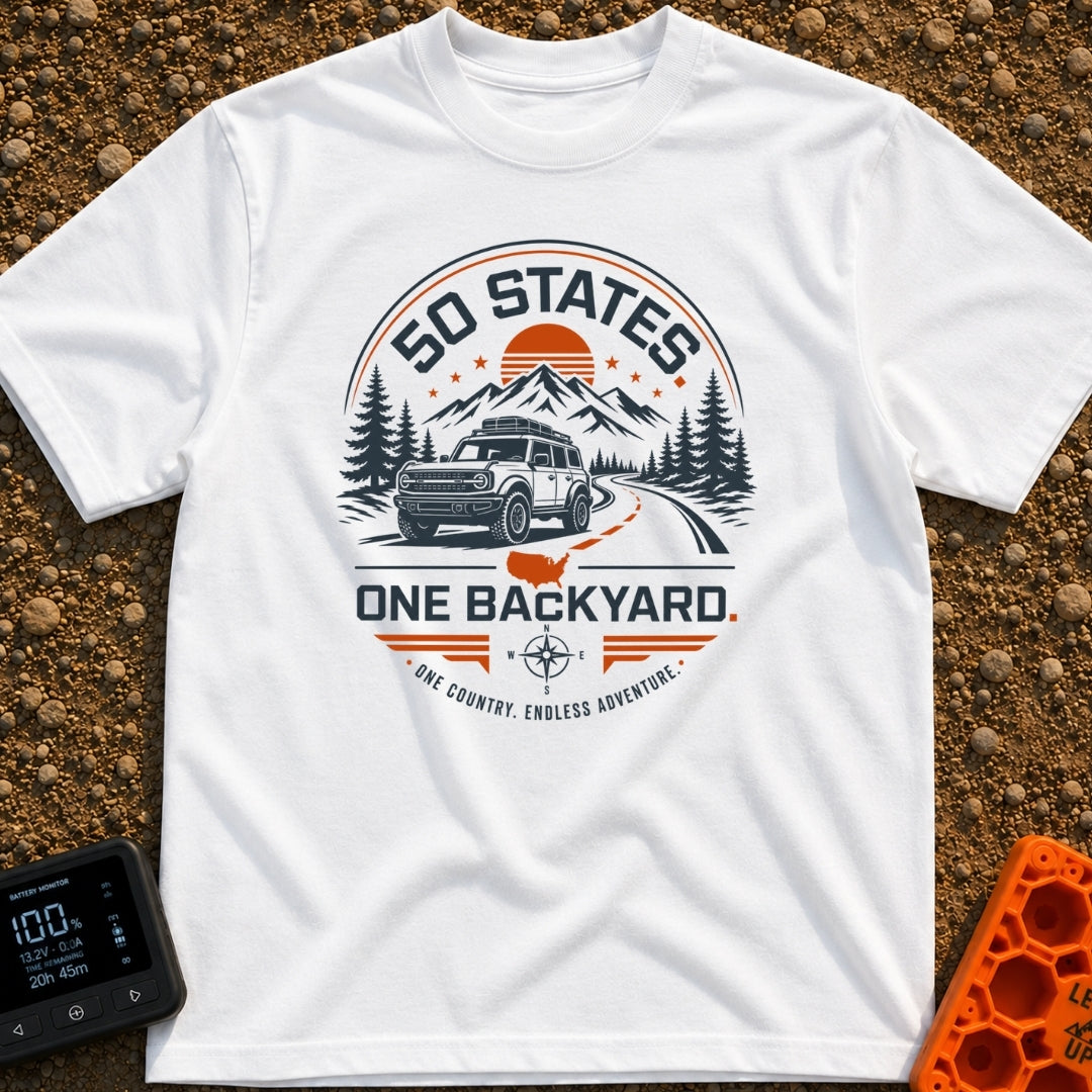 Fifty State Backyard - T-Shirt in White - A circular badge design featuring an off-road SUV parked next to a winding...