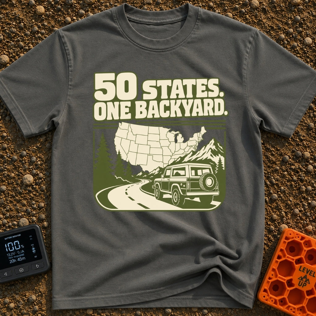 Every State Playground - T-Shirt in Pepper - A green and cream illustration featuring the text "50 STATES. ONE BACKYARD."...