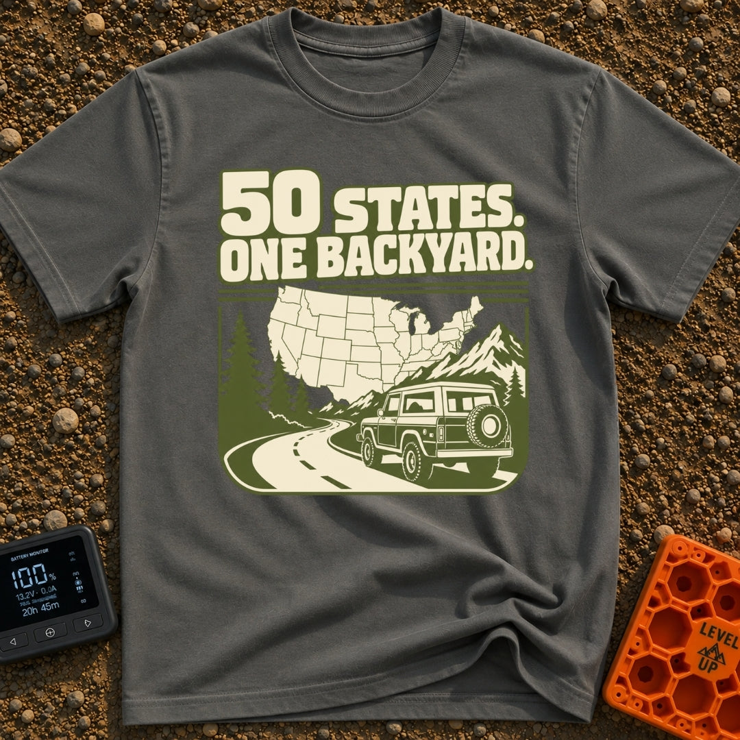 Every State Playground - T-Shirt in Pepper - A green and cream illustration featuring the text "50 STATES. ONE BACKYARD."...