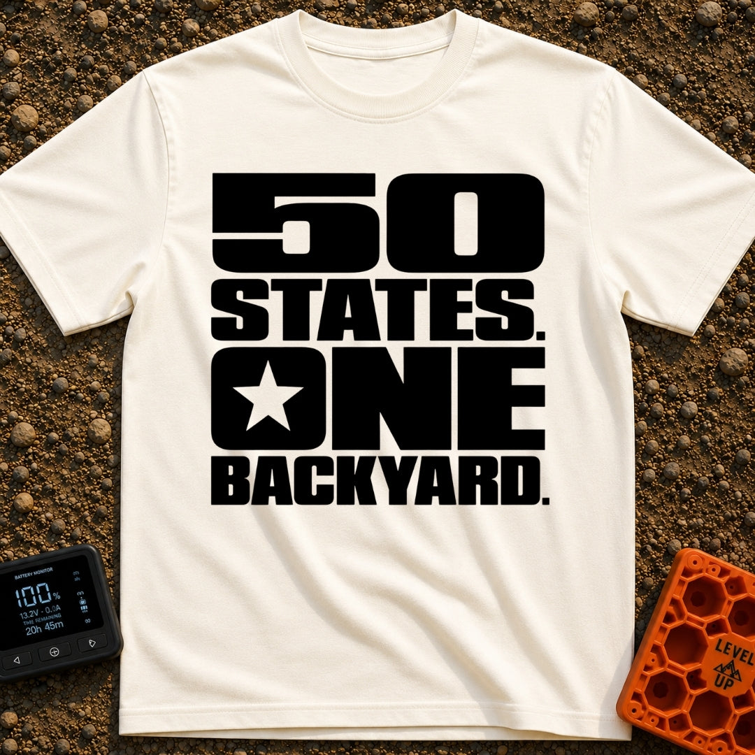 Fifty States One Backyard - T-Shirt in Ivory - Bold black stacked typography that reads "50 STATES. ONE BACKYARD." with a...