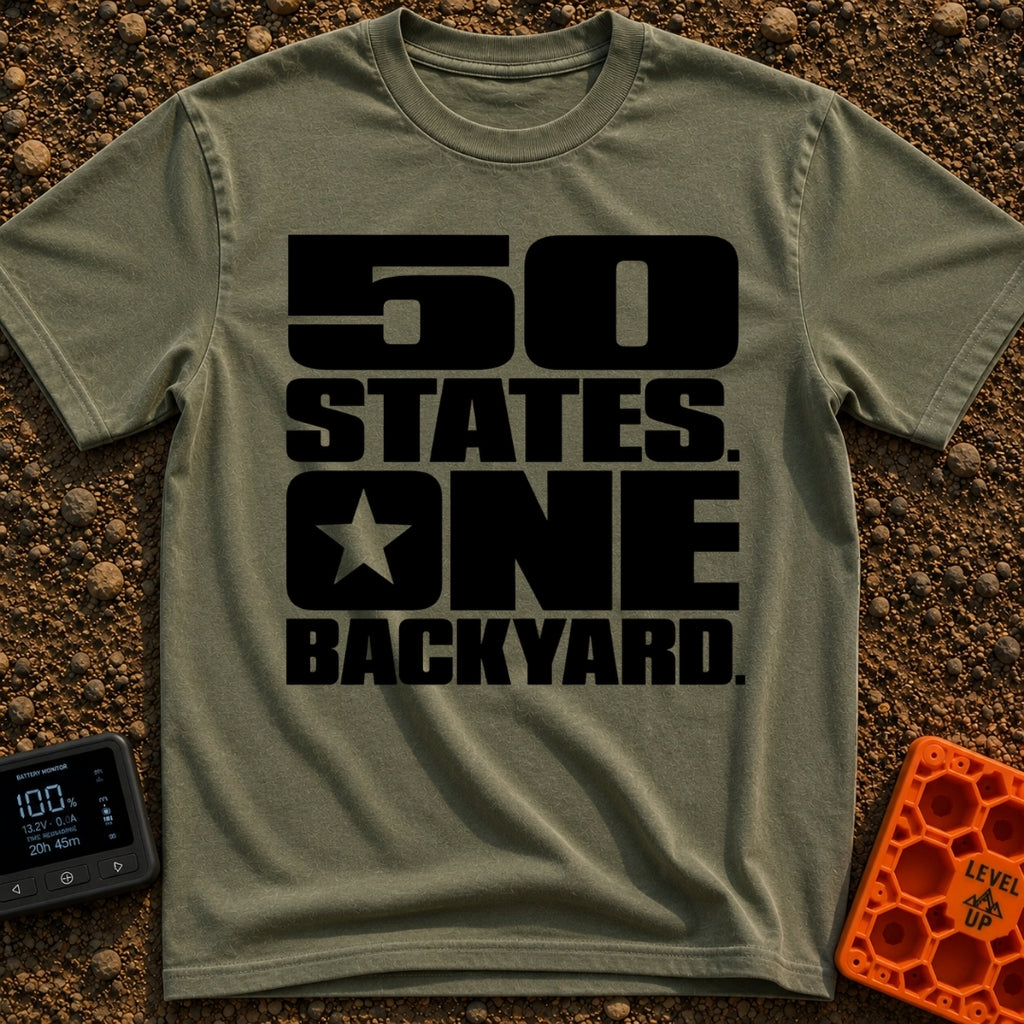 Fifty States One Backyard - T-Shirt in Moss - Bold black stacked typography that reads "50 STATES. ONE BACKYARD." with a...