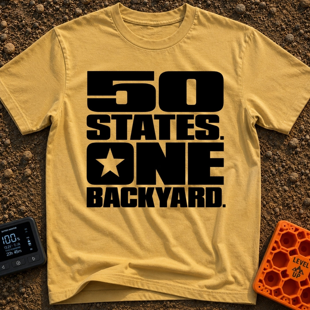 Fifty States One Backyard - T-Shirt in Mustard - Bold black stacked typography that reads "50 STATES. ONE BACKYARD." with...