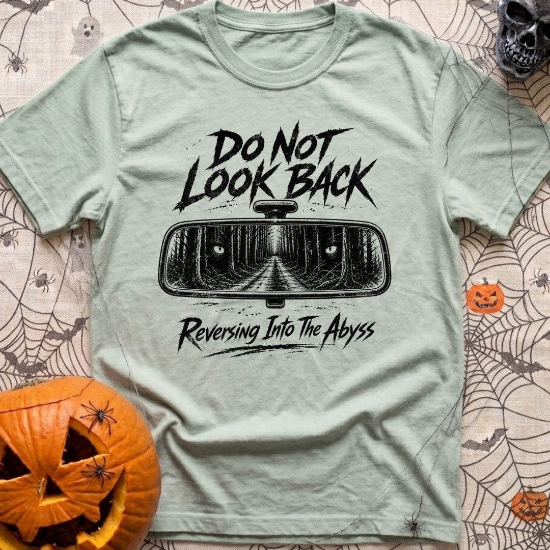 Backing Into The Abyss - T-Shirt in Bay - A black and white illustration of a vehicle's rearview mirror reflecting a dark...