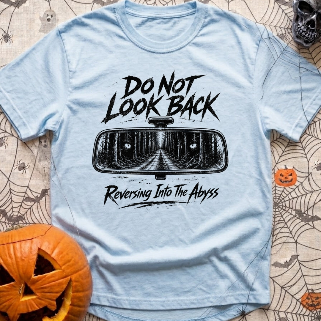 Backing Into The Abyss - T-Shirt in Chambray - A black and white illustration of a vehicle's rearview mirror reflecting a...