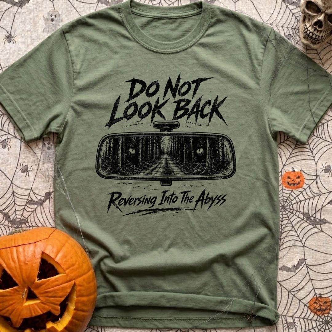 Backing Into The Abyss - T-Shirt in Moss - A black and white illustration of a vehicle's rearview mirror reflecting a...