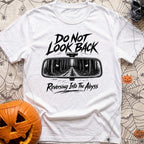 Backing Into The Abyss - T-Shirt in White - A black and white illustration of a vehicle's rearview mirror reflecting a...