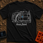 Bearly Logged In - T-Shirt in Black - A black-and-white illustration of a bear standing on its hind legs next to a travel...