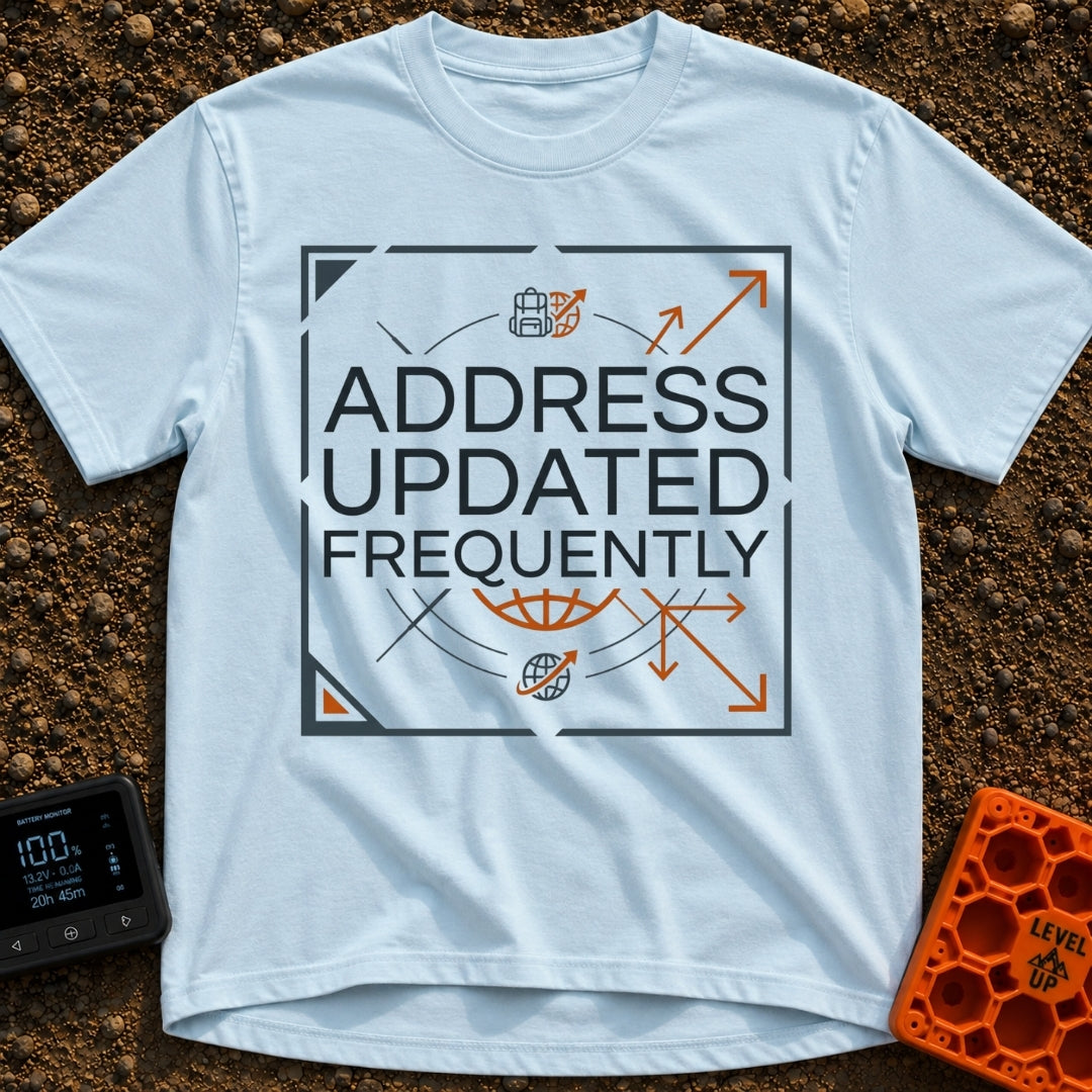 No Fixed Address - T-Shirt in Chambray - The text "ADDRESS UPDATED FREQUENTLY" is centered inside a square border with...