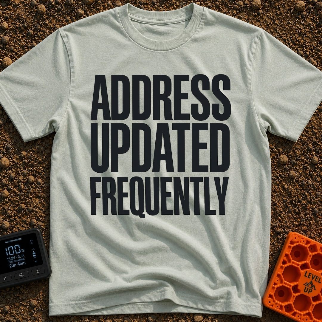 Location Not Found - T-Shirt in Bay - A text-only design featuring the phrase "ADDRESS UPDATED FREQUENTLY" stacked in...