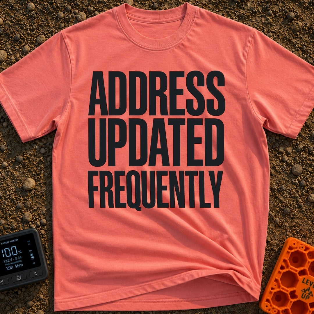 Location Not Found - T-Shirt in Watermelon - A text-only design featuring the phrase "ADDRESS UPDATED FREQUENTLY" stacked...