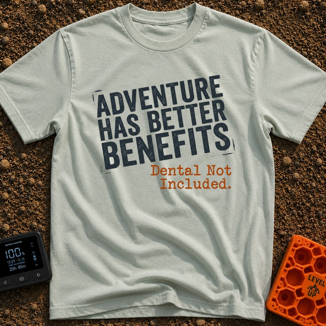 Dental Not Included - T-Shirt in Bay - A text-based design featuring the phrase "ADVENTURE HAS BETTER BENEFITS" in a...