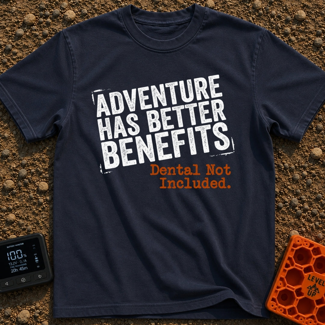 Dental Not Included - T-Shirt in Navy - A text-based design featuring the phrase "ADVENTURE HAS BETTER BENEFITS" in a...