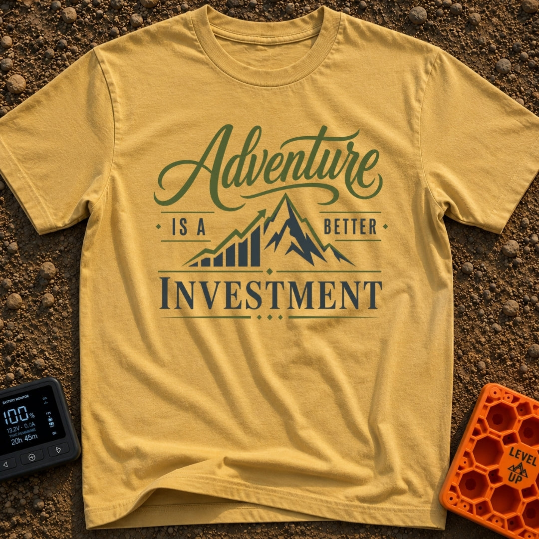 Return On Adventure - T-Shirt in Mustard - A typographic design reading "Adventure IS A BETTER INVESTMENT" featuring a...