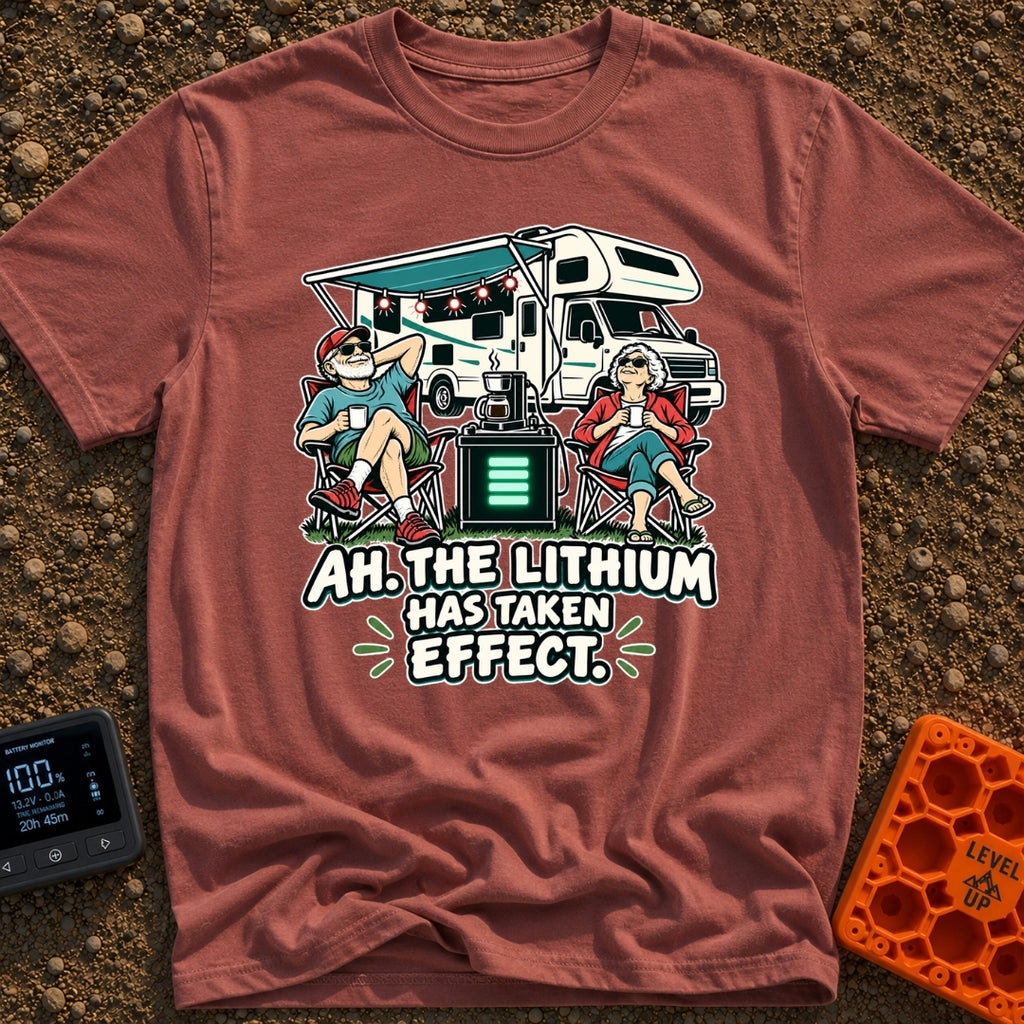Lithium Has Kicked In - T-Shirt in Brick - An older man and woman are relaxing in camp chairs drinking coffee in front of...