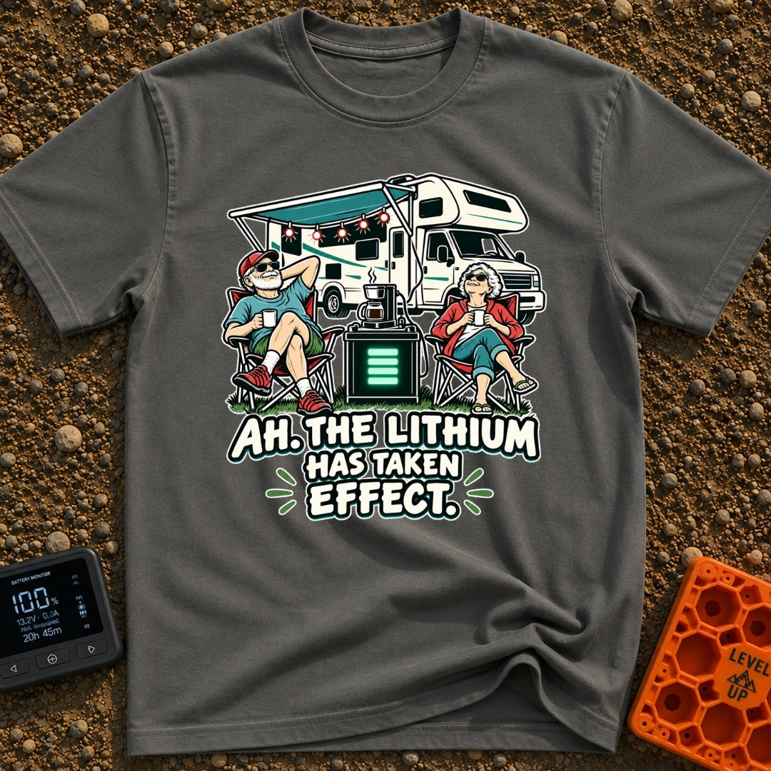 Lithium Has Kicked In - T-Shirt in Pepper - An older man and woman are relaxing in camp chairs drinking coffee in front...