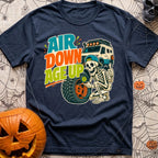 Aired Down Aged Up - T-Shirt in Navy - A cartoon skeleton wearing a backwards baseball cap gives a thumbs-up while using...