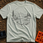 The Real Airplane Mode - T-Shirt in Bay - A black and white line drawing of a smartphone resting on a wooden picnic table...
