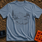 The Real Airplane Mode - T-Shirt in Blue Jean - A black and white line drawing of a smartphone resting on a wooden picnic...