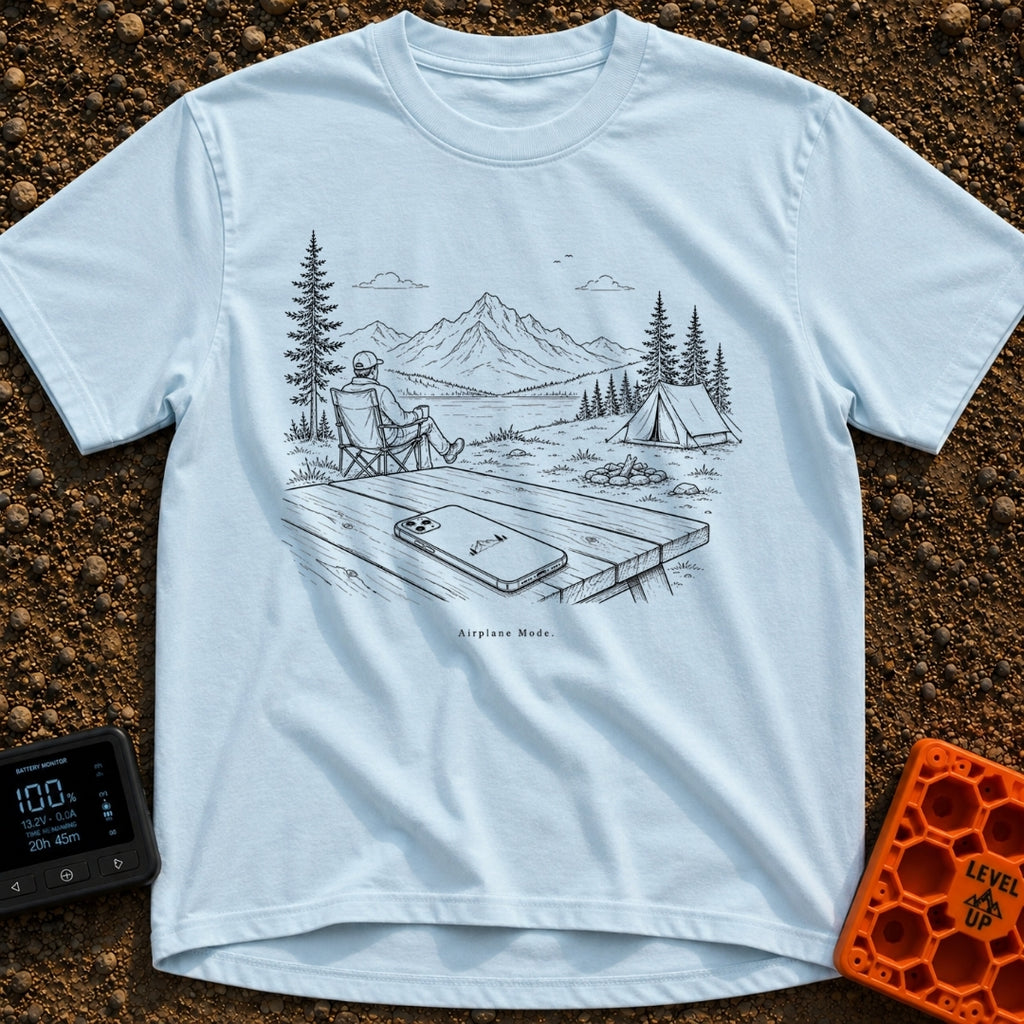 The Real Airplane Mode - T-Shirt in Chambray - A black and white line drawing of a smartphone resting on a wooden picnic...