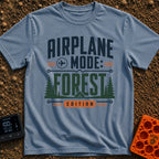 Forest On Airplane Mode - T-Shirt in Blue Jean - A typographic design reading "AIRPLANE MODE: FOREST EDITION" featuring...