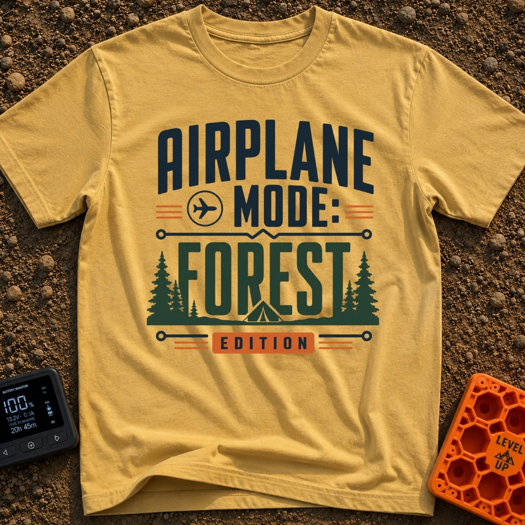 Forest On Airplane Mode - T-Shirt in Mustard - A typographic design reading "AIRPLANE MODE: FOREST EDITION" featuring an...