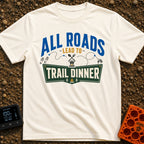 Finding Trail Dinner - T-Shirt in Ivory - A typographic design reading "ALL ROADS LEAD TO TRAIL DINNER" with a dotted...