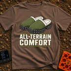 Four Wheel Lounge - T-Shirt in Espresso - An illustration of a pair of green, fleece-lined slippers that have thick,...
