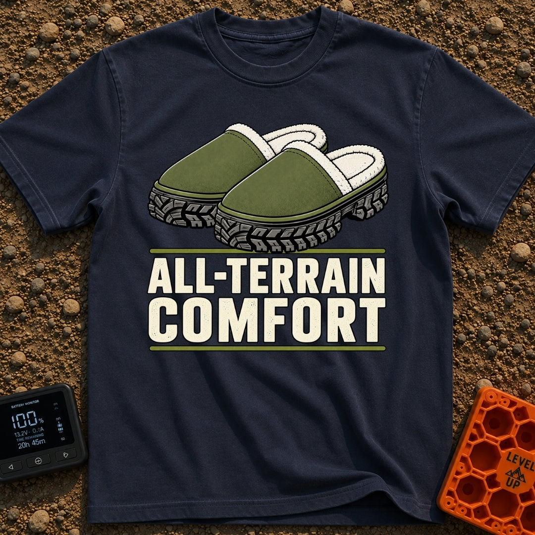 Four Wheel Lounge - T-Shirt in Navy - An illustration of a pair of green, fleece-lined slippers that have thick,...