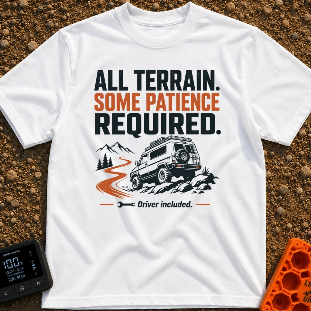 All Terrain Patience Required - T-Shirt in White - A rugged camper van is shown driving over a rocky surface beside a...