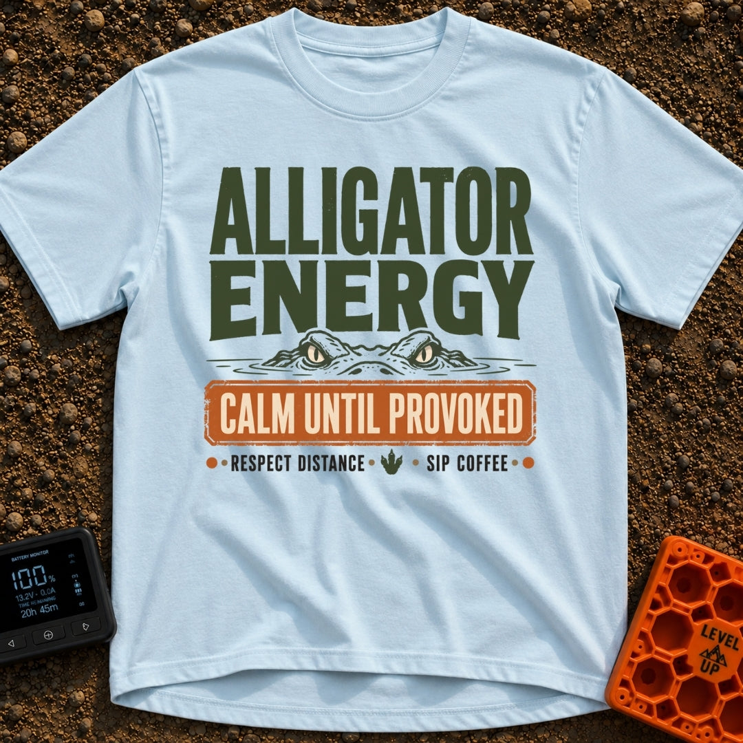 Calm Until Provoked - T-Shirt in Chambray - The artwork features the top half of an alligator's head with its eyes...