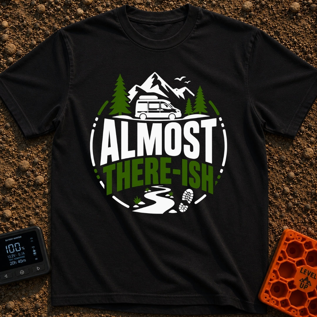 Are We There Ish - T-Shirt in Black - A circular graphic design featuring the text 'ALMOST THERE-ISH' situated between an...