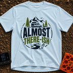Are We There Ish - T-Shirt in Chambray - A circular graphic design featuring the text 'ALMOST THERE-ISH' situated between...