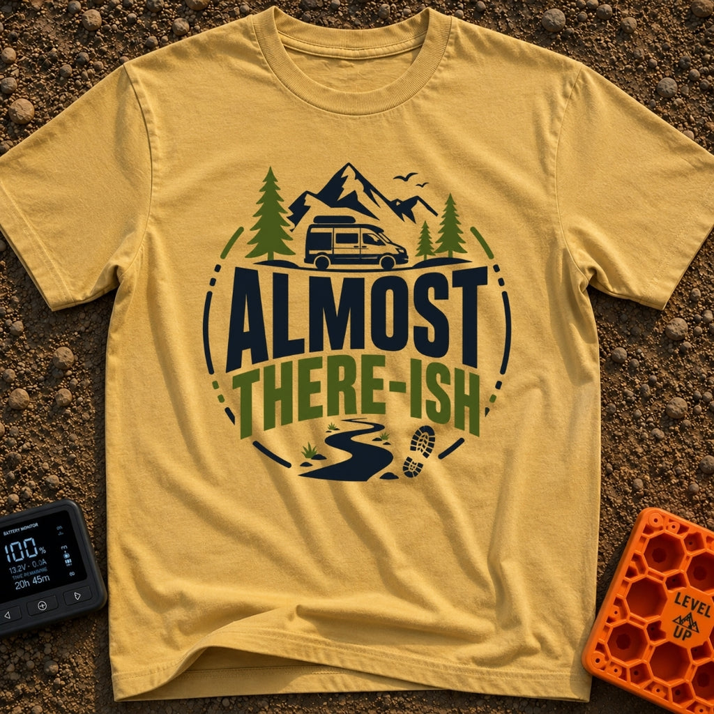 Are We There Ish - T-Shirt in Mustard - A circular graphic design featuring the text 'ALMOST THERE-ISH' situated between...