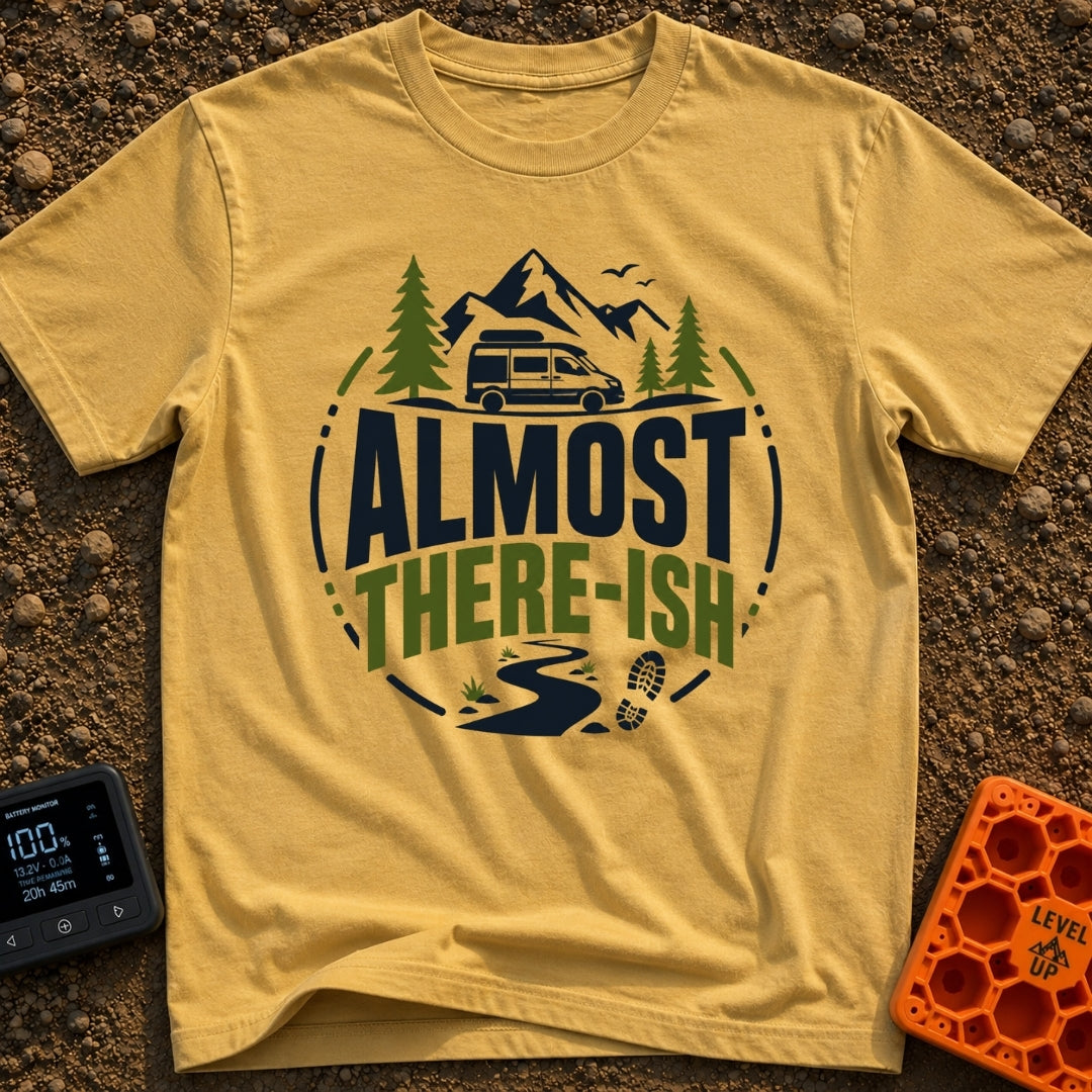 Are We There Ish - T-Shirt in Mustard - A circular graphic design featuring the text 'ALMOST THERE-ISH' situated between...