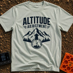 Altitude Adjustment Required - T-Shirt in Bay - A black and white graphic featuring the text "ALTITUDE ADJUSTMENT" above...