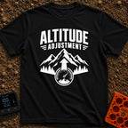 Altitude Adjustment Required - T-Shirt in Black - A black and white graphic featuring the text "ALTITUDE ADJUSTMENT"...