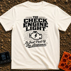 Check Engine Night Light - T-Shirt in Ivory - A distressed typographic design that reads "THE CHECK ENGINE LIGHT Is Just...