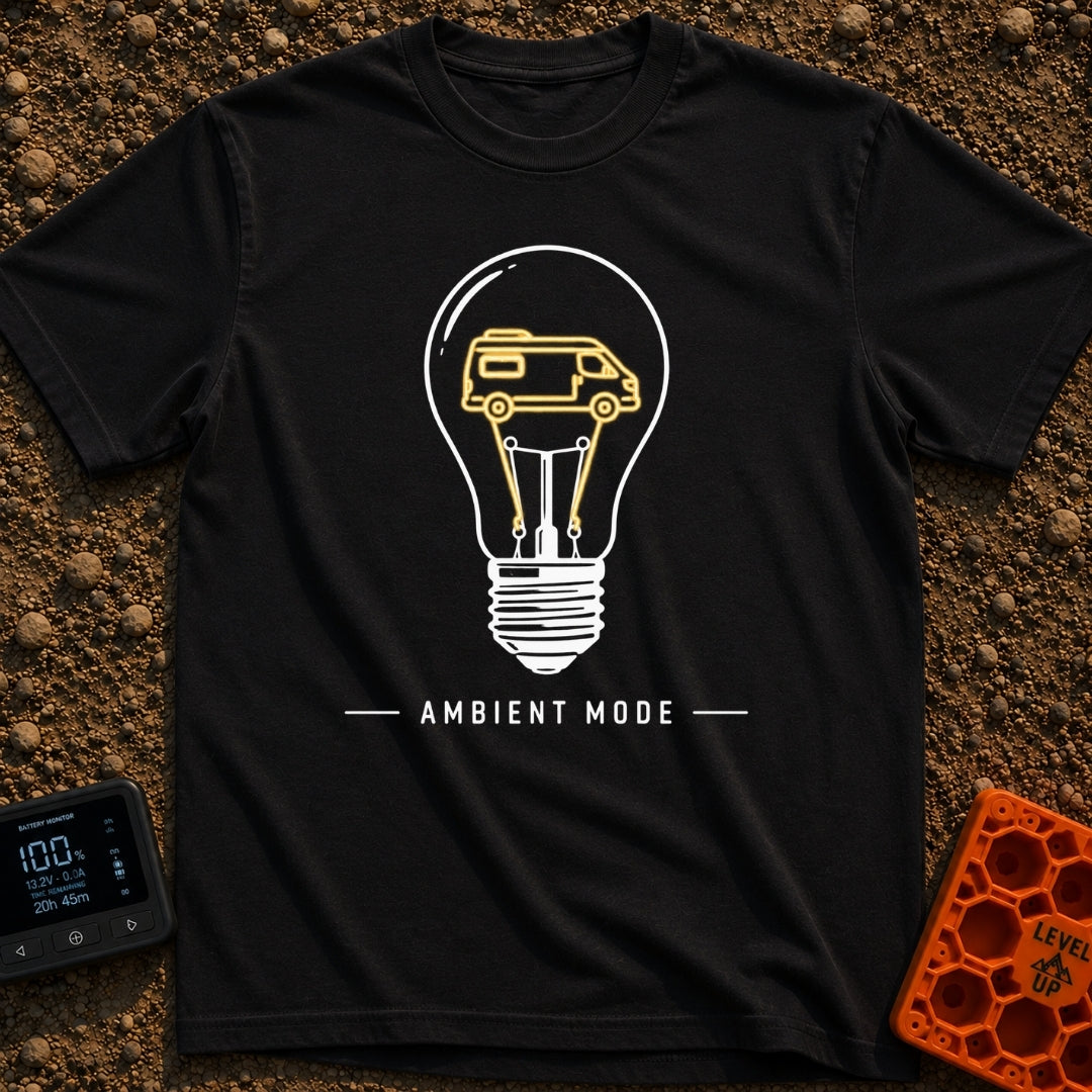 Switch To Ambient Mode - T-Shirt in Black - A black and white line drawing of a standard lightbulb featuring a glowing...