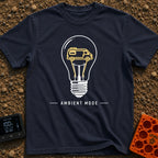 Switch To Ambient Mode - T-Shirt in Navy - A black and white line drawing of a standard lightbulb featuring a glowing...