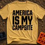 America Is My Campsite - T-Shirt in Mustard - Bold, black, uppercase text reading "AMERICA IS MY CAMPSITE" stacked in...