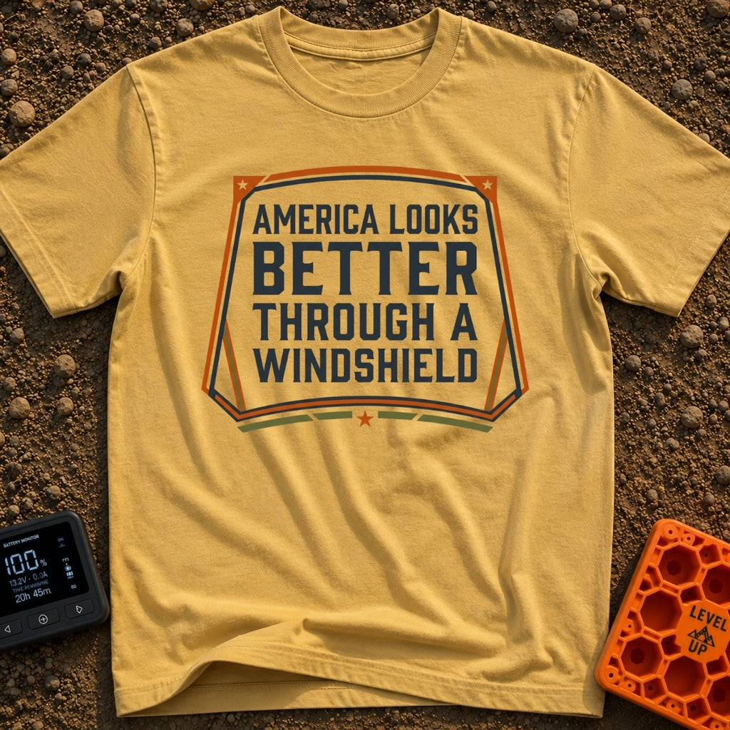 Better Through A Windshield - T-Shirt in Mustard - A typographic design featuring the phrase "AMERICA LOOKS BETTER...