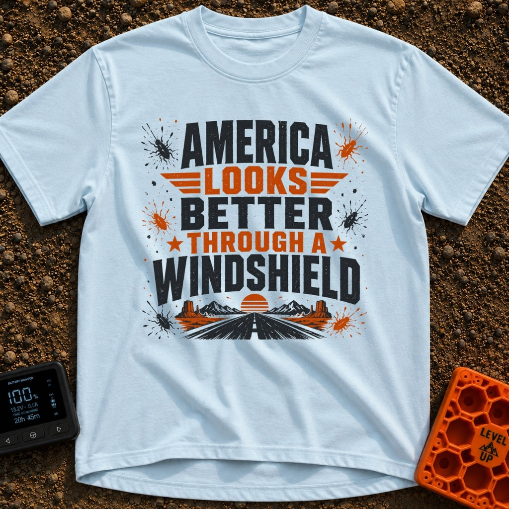 Better Through A Windshield - T-Shirt in Chambray - Text reading "AMERICA LOOKS BETTER THROUGH A WINDSHIELD" surrounded...