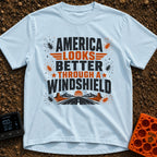 Better Through A Windshield - T-Shirt in Chambray - Text reading "AMERICA LOOKS BETTER THROUGH A WINDSHIELD" surrounded...