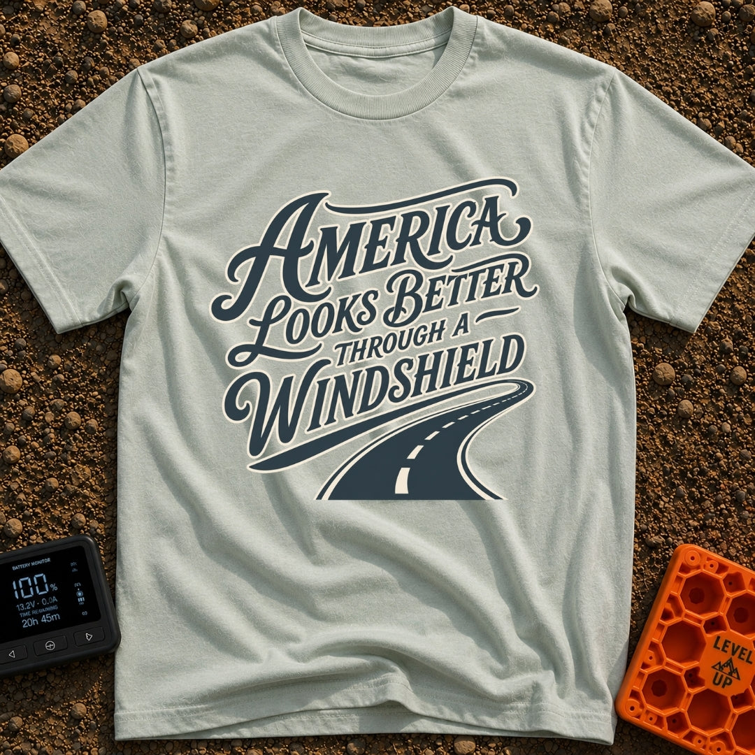 Better Through A Windshield - T-Shirt in Bay - Stylized typography reading "America Looks Better Through A Windshield"...