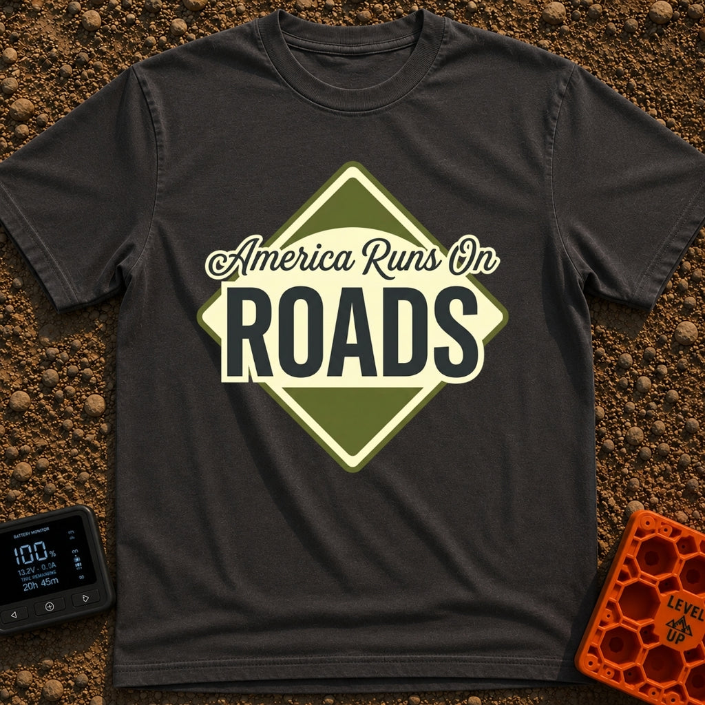 America runs On Roads - T-Shirt in Graphite - A diamond-shaped, olive green and pale yellow graphic resembling a road...