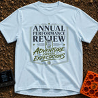 Adventure Exceeds Expectations - T-Shirt in Chambray - A typographic badge design featuring the text 'ANNUAL PERFORMANCE...